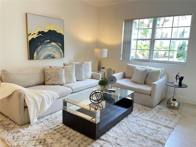 living room with ornamental molding and tile flooring