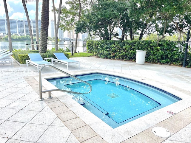 view of pool featuring a patio