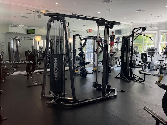 exercise room with ceiling fan