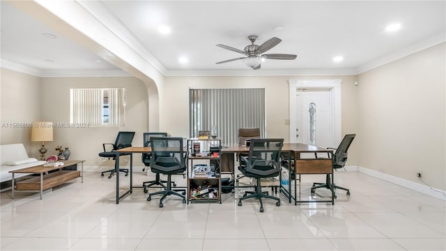 dining room with ornamental molding, ceiling fan, and light tile floors