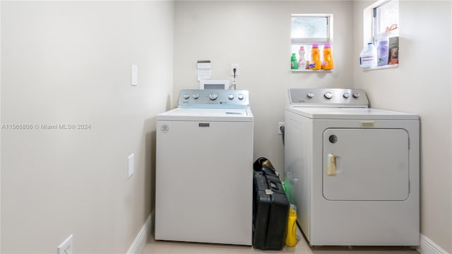 laundry area with washer hookup and washing machine and dryer