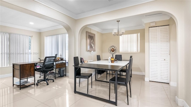 dining room with a wealth of natural light, crown molding, and light tile floors