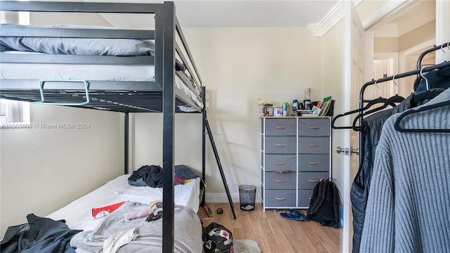 bedroom with light wood-type flooring