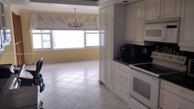 kitchen with white cabinets, white appliances, crown molding, and a notable chandelier