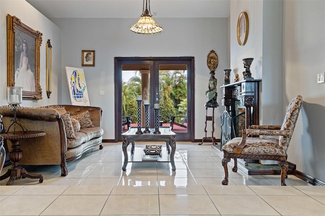 tiled living room featuring french doors