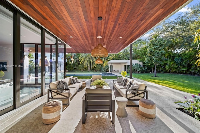 view of patio with an outdoor structure and an outdoor living space