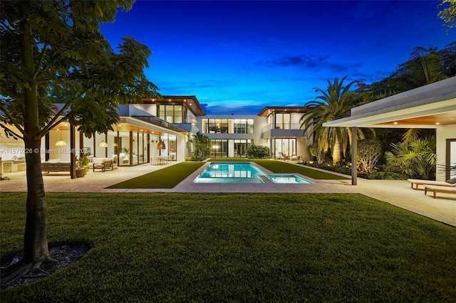 view of patio / terrace with an outdoor living space, an outdoor kitchen, and area for grilling