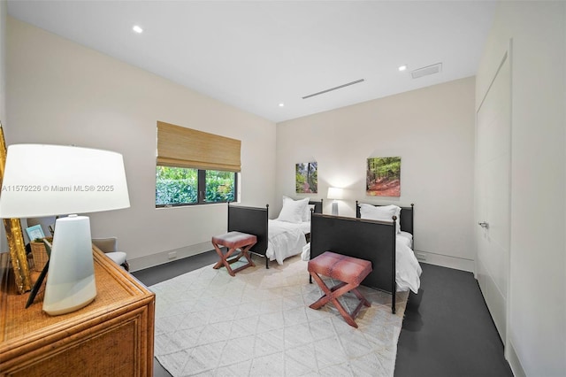 bedroom featuring baseboards, visible vents, and recessed lighting