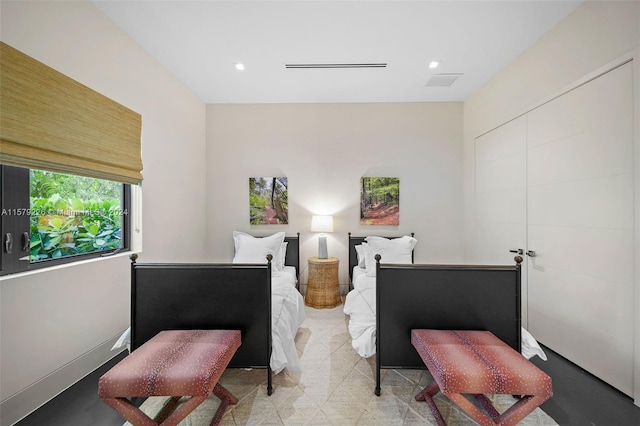 bathroom featuring walk in shower, concrete flooring, vanity, tile walls, and toilet