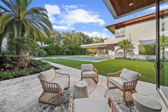 view of patio / terrace with an outdoor pool