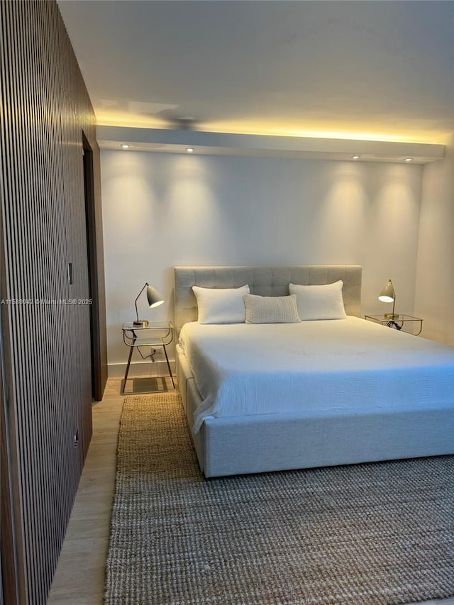 bedroom featuring wood-type flooring