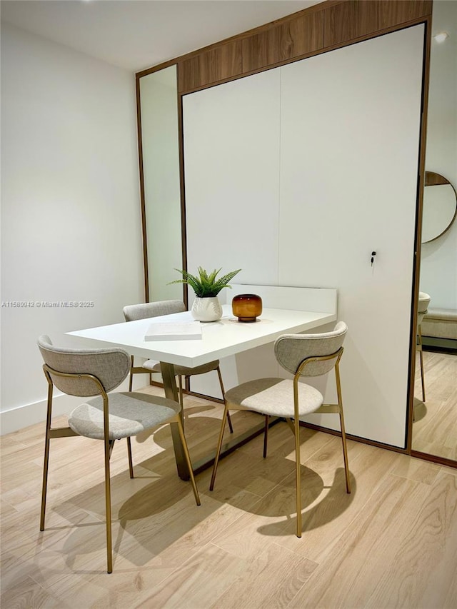 dining area featuring light hardwood / wood-style flooring