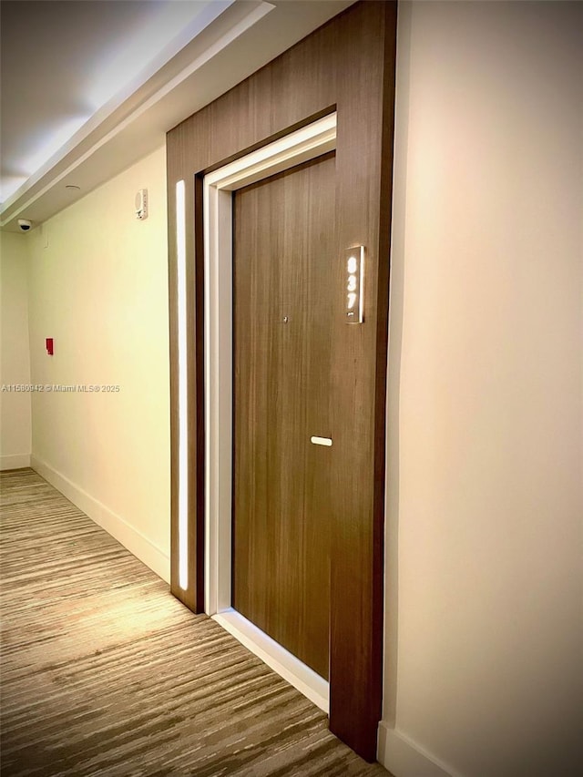 corridor featuring light wood-type flooring