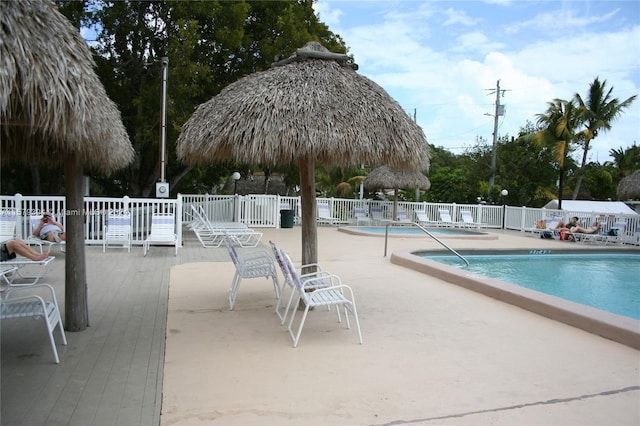 view of pool with a patio area and a gazebo