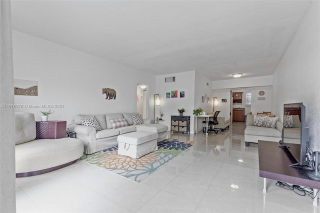 living room featuring tile flooring