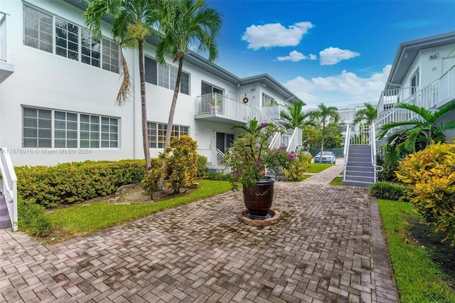 surrounding community with a patio area