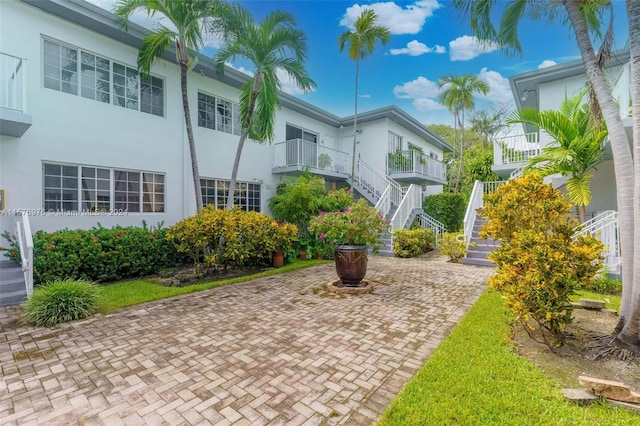 surrounding community featuring a patio