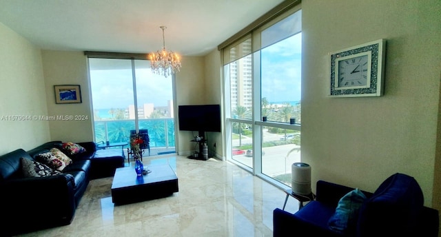 living room with an inviting chandelier, tile flooring, and expansive windows