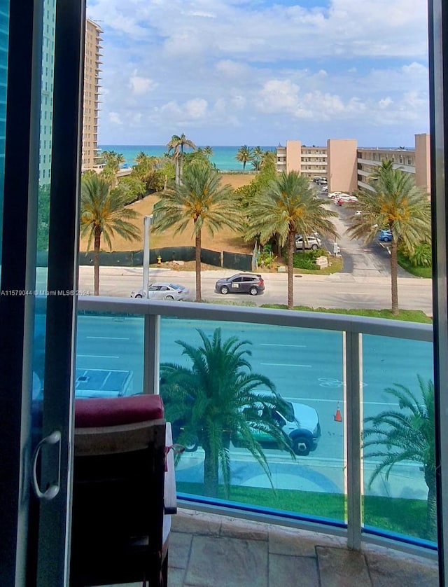 view of pool featuring a water view