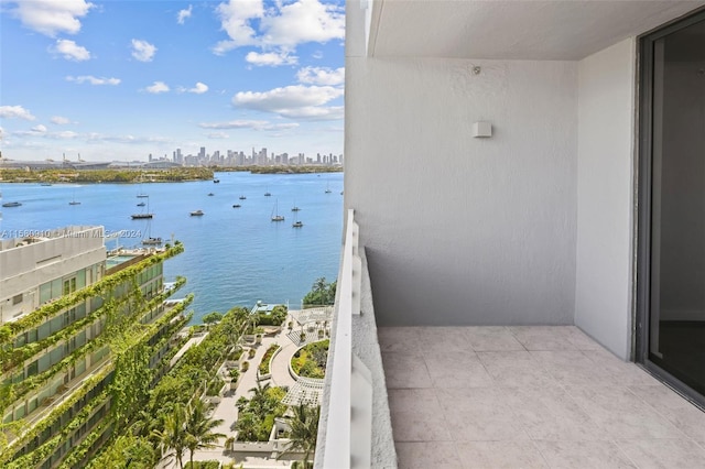 balcony featuring a water view