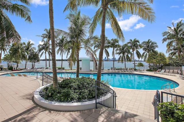 view of swimming pool featuring a patio area