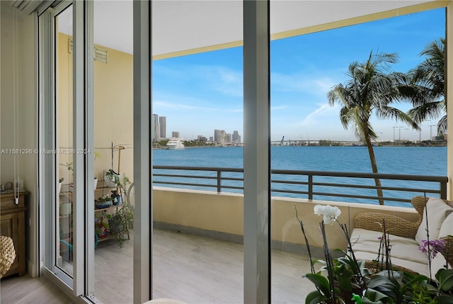 balcony featuring a water view