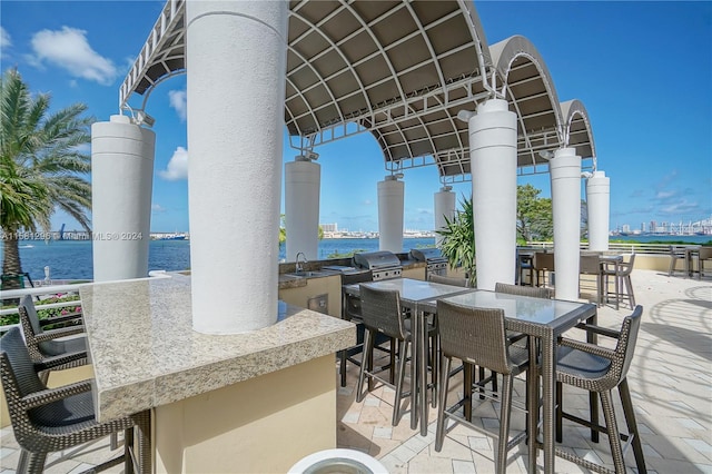 view of patio / terrace featuring a water view