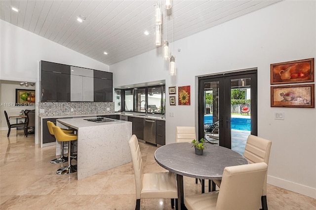 dining area with french doors, high vaulted ceiling, wooden ceiling, and sink