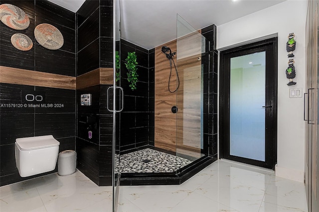 bathroom featuring toilet and walk in shower