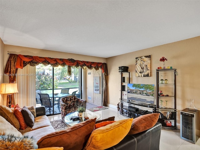 tiled living room with a textured ceiling