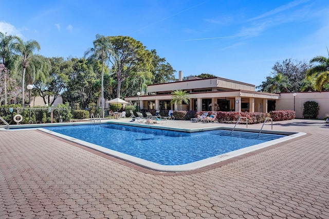 view of pool featuring a patio area