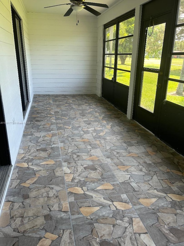 6114 SE Georgetown Pl, Hobe Sound, FL 33455 - unfurnished sunroom with french doors and ceiling fan