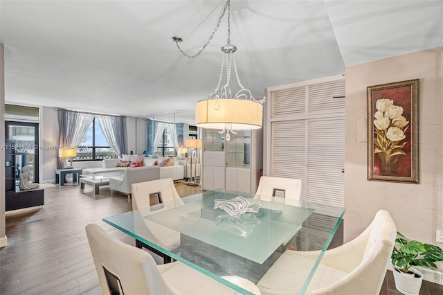 dining area featuring hardwood / wood-style floors