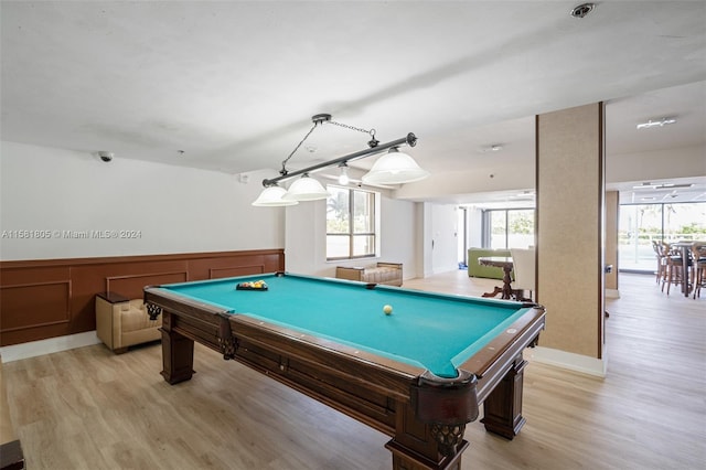 game room with light hardwood / wood-style flooring and pool table