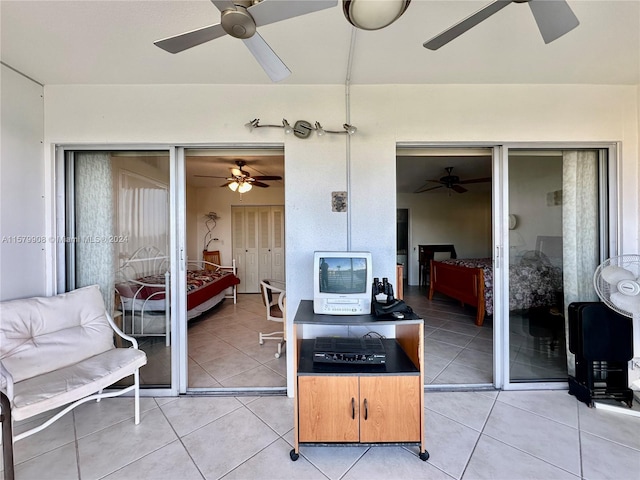 interior space featuring ceiling fan