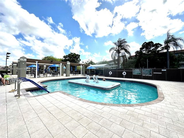 view of pool featuring a patio