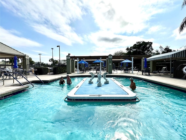 view of pool with a patio area