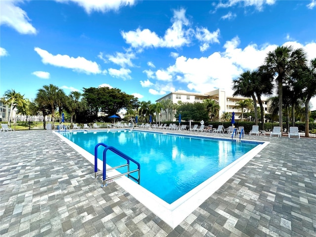 view of swimming pool with a patio area