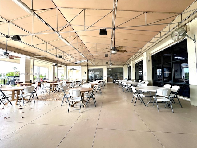 view of patio featuring ceiling fan