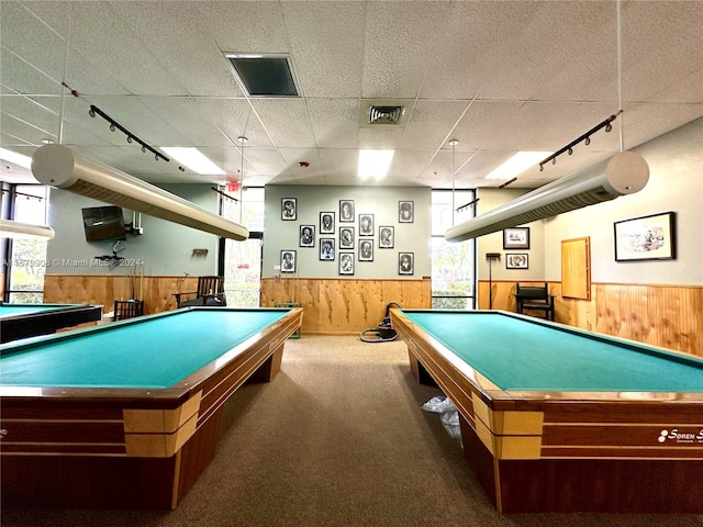 rec room with a paneled ceiling, pool table, carpet flooring, track lighting, and a wealth of natural light