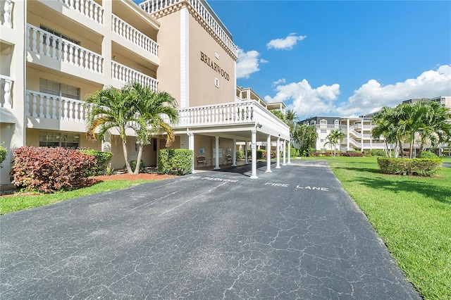 view of property featuring a carport