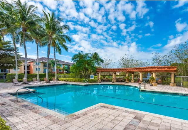 view of pool featuring a patio