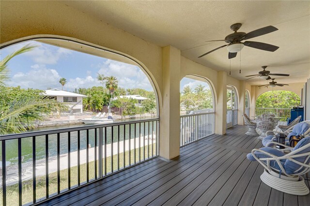 wooden terrace with ceiling fan