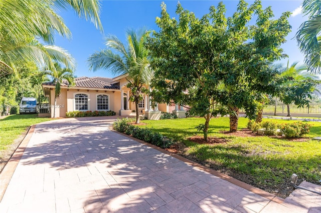 view of front of home with a front yard