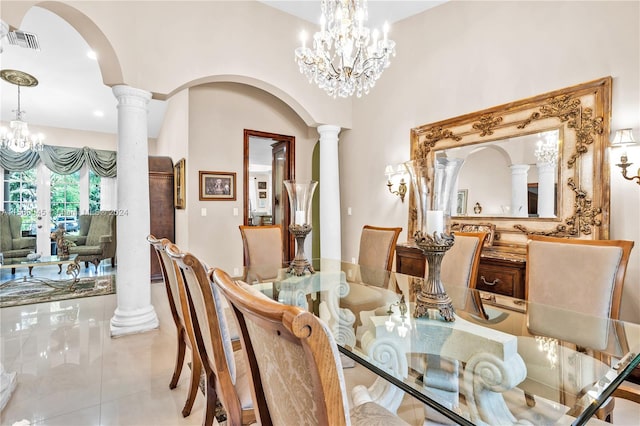 dining room with decorative columns, french doors, tile patterned flooring, and an inviting chandelier