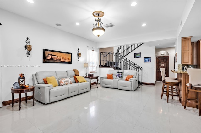 living room with light tile patterned floors