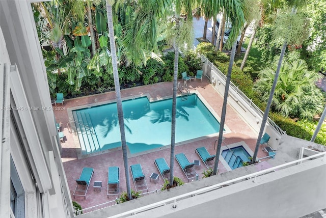 view of swimming pool featuring a patio