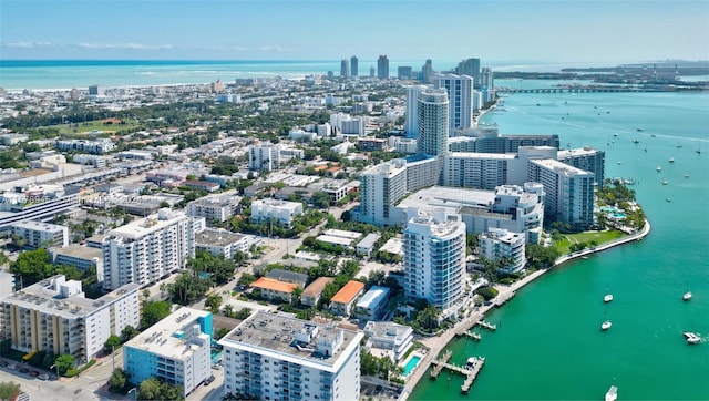 bird's eye view with a water view