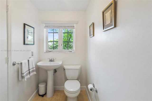 bathroom featuring toilet