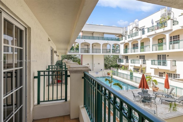 balcony with a community pool